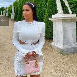 White embroidered bell sleeve dress with appliqué